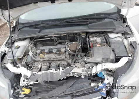 2014 Ford Focus Titanium z USA, uszkodzony, nr VIN 1FADP3J27EL405024